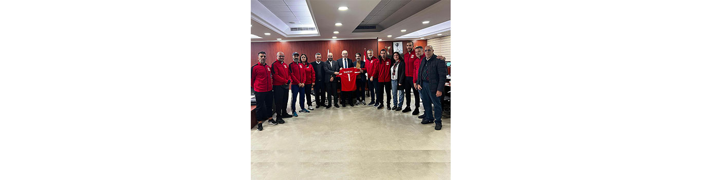 President Badran receives number one jersey