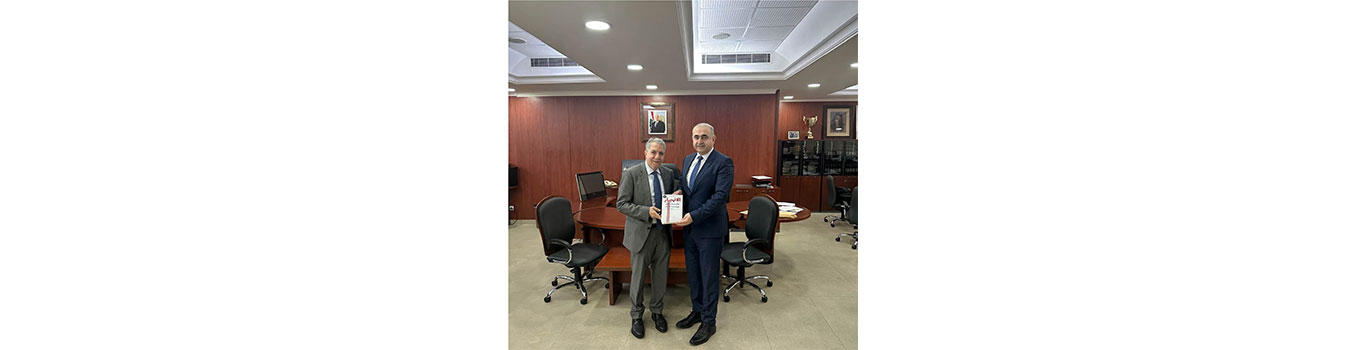 President Badran receives a copy of former Minister of Finance Ghazi Wazni’s new book